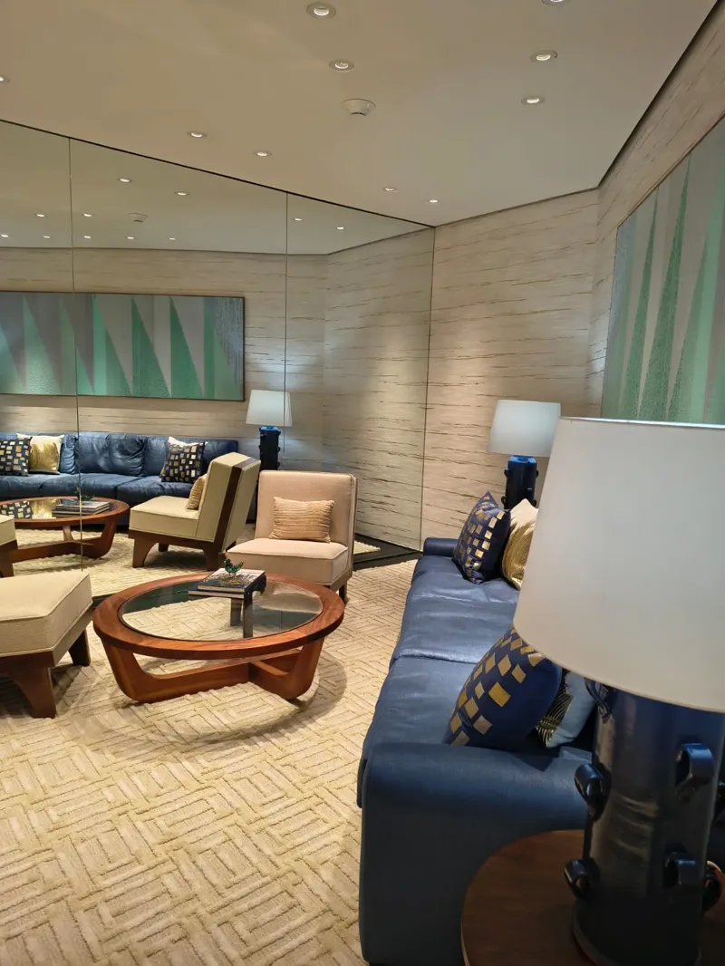 Private seating room with a blue sofa