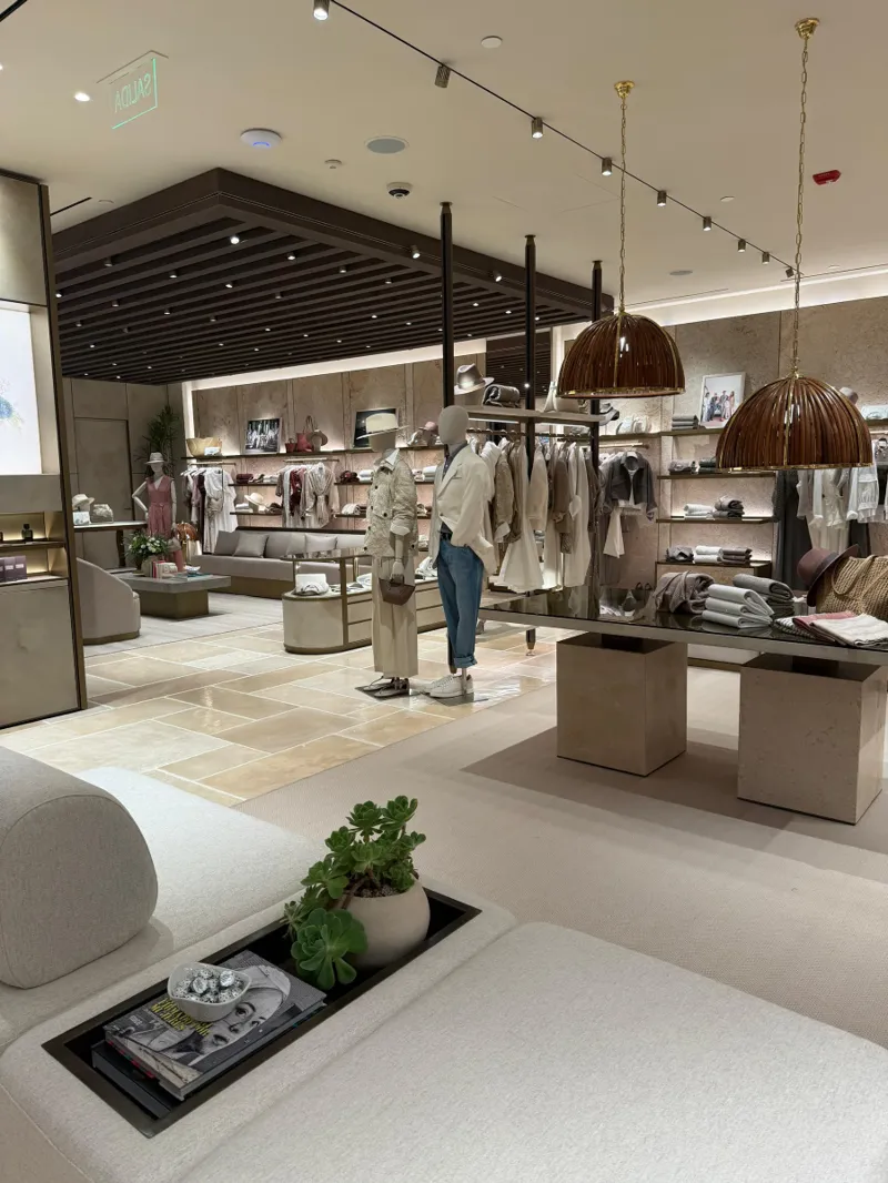 Seating and displays beneath pendant lights