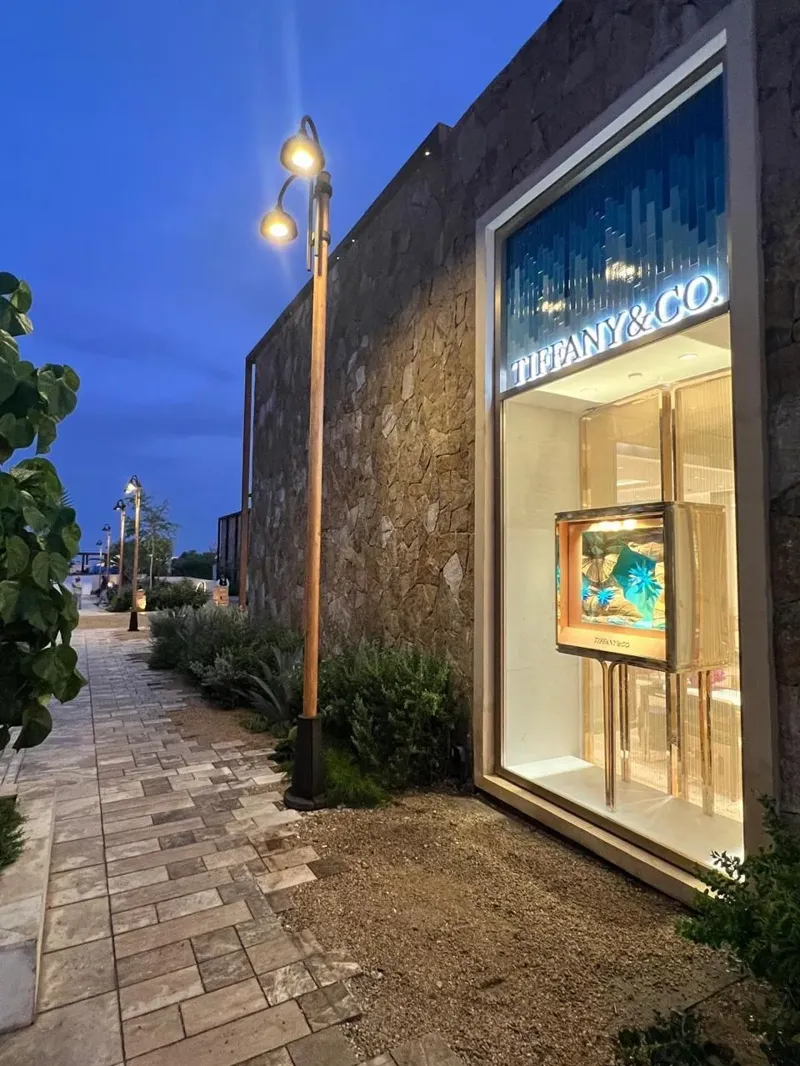 Illuminated display window and stone facade